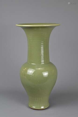 A CHINESE LONGQUAN CELADON YENYEN VASE. Heavily potted with ...