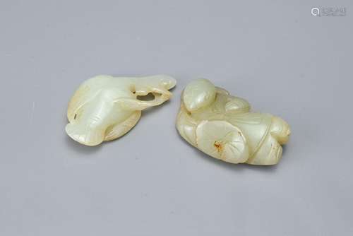 TWO CHINESE CARVED JADE ITEMS. Comprising; a pale jade bird ...