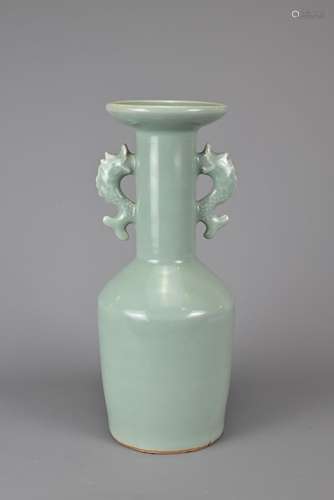 A LARGE CHINESE CELADON GLAZED KINUTA VASE. Of mallet form w...