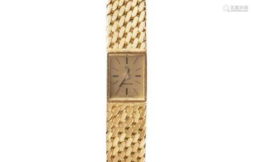 OMEGA
Montre bracelet de dame en or 750°/00, boitier re