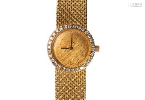 Montre bracelet de dame boitier rond et bracelet souple