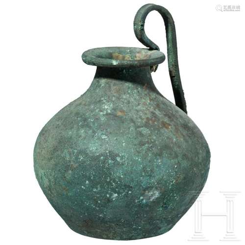 A Greek bronze jug, 5th century B.C.