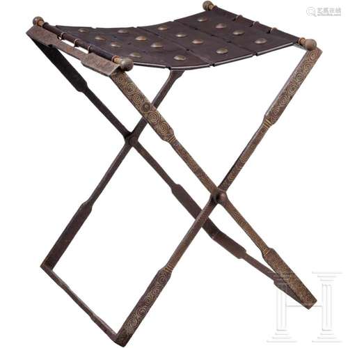 A Roman folding chair, iron with inlays, 4th century A.D.