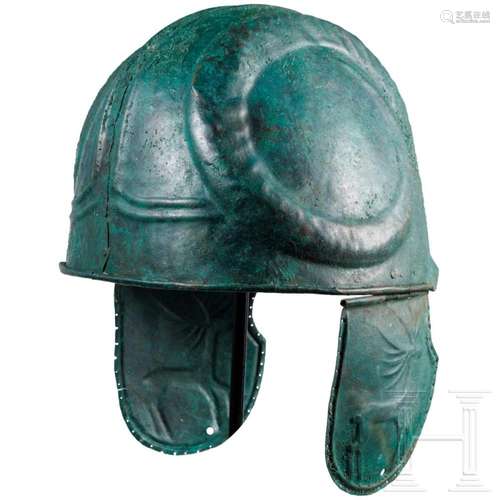 A bronze helmet with ram's horns, northern Black Sea are...