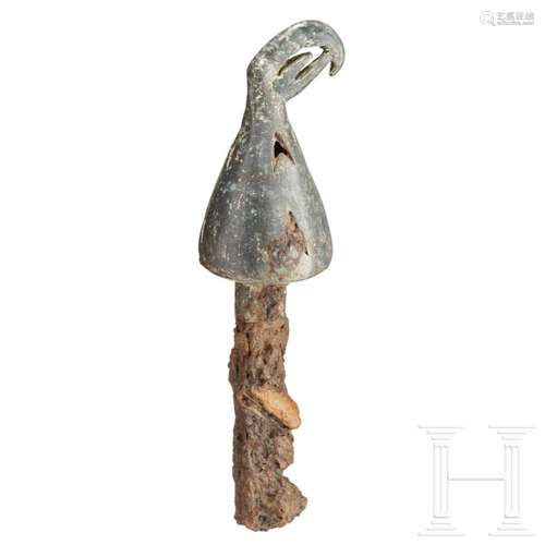 A Scythian stick attachment (rattle with bird of prey head),...