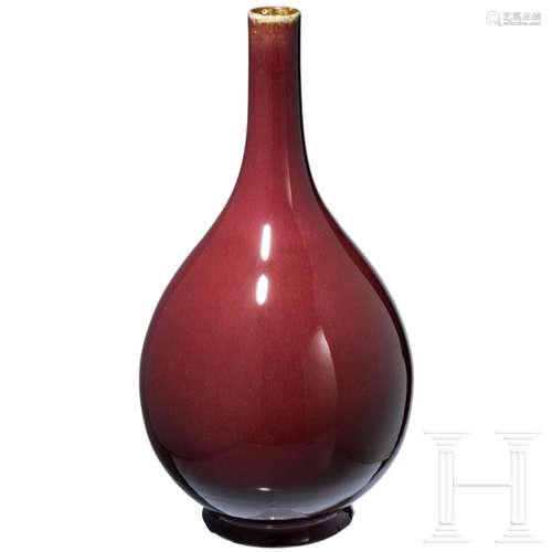 A large Chinese copper-red vase with Qianlong six-character ...