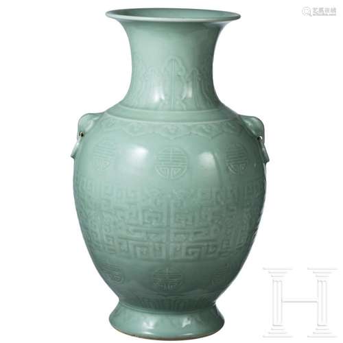 A large Chinese moulded celadon vase, probably 19th century