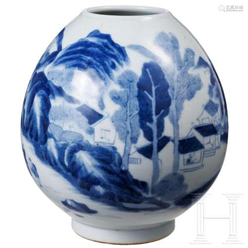 A Chinese blue and white water pot with mountain and river s...