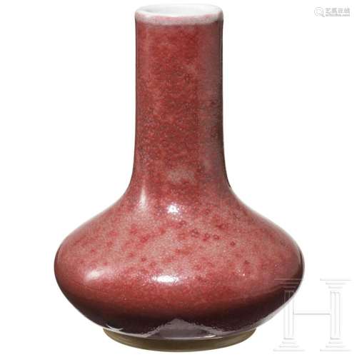 A small copper-red glazed vase with Yongzheng six-character ...
