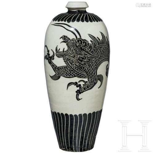 A large Chinese Cizhou ware dragon vase, probably Yin-Yuan D...