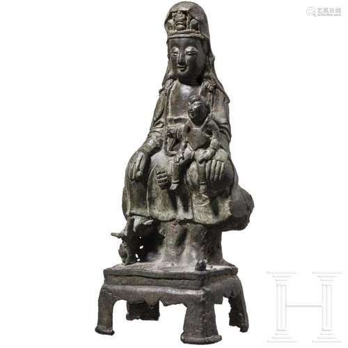 A Chinese bronze figure of Songzi Guanyin, probably Ming Dyn...