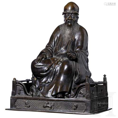 A Chinese bronze statue of seated Shou Xing, 19th century