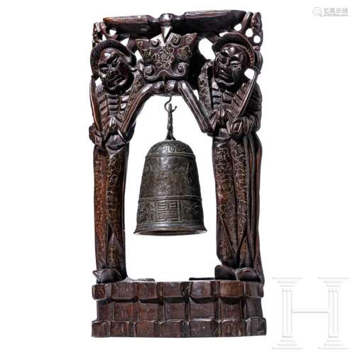 A Chinese temple bell with carved stand, 20th century