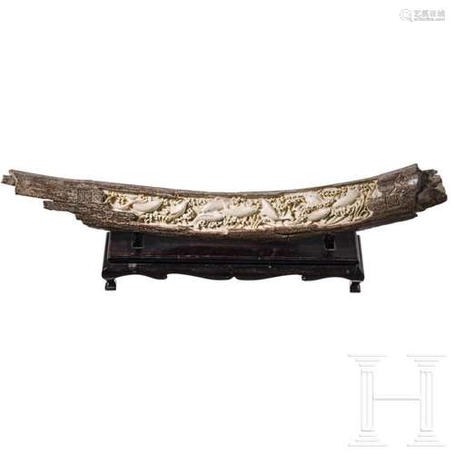 A Chinese mammoth tusk carved with fish, 20th century