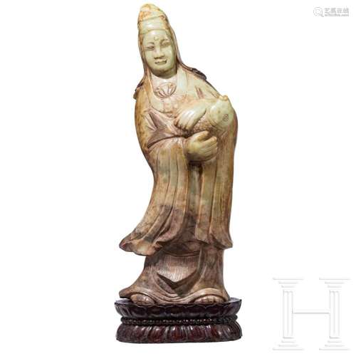 A large Chinese jade figure of Guanyin as a fishermen's ...