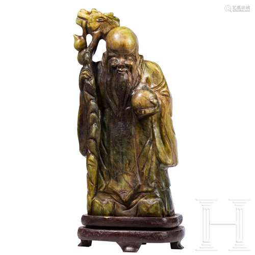 A monumental Chinese jade sculpture of Shou Xing, 20th centu...