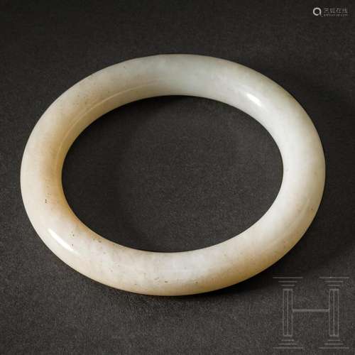 A Chinese jade bangle, 20th century