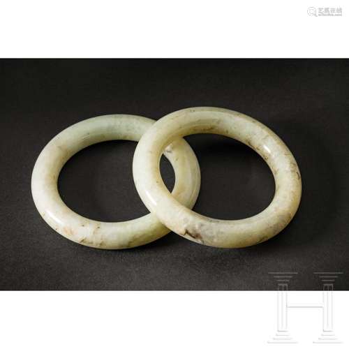 A pair of Chinese jade bangles, 20th century