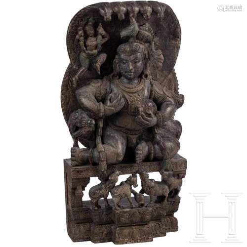 A large Indian wooden sculpture of Shiva and Vasuki, 18th/19...