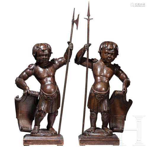 A pair of Northern Italian walnut guardian sculptures, late ...