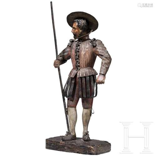 A Spanish toleware figure of a soldier, 17th century