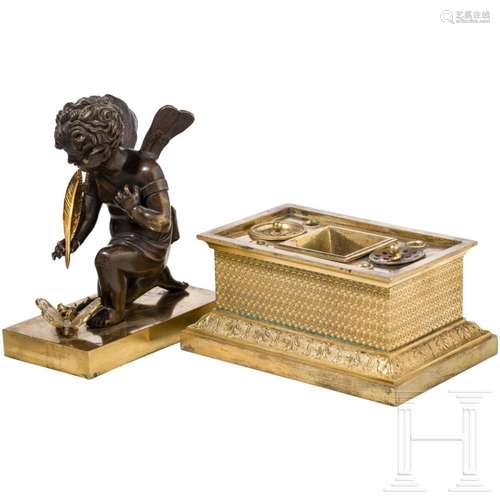 A French ormolu ink set with putto, circa 1880