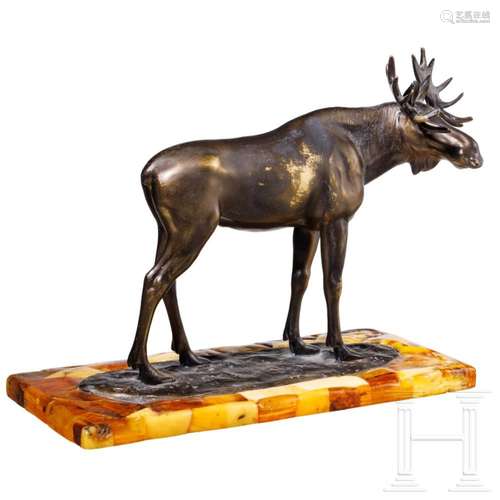 A bronze elk figure on an amber stand, Hendrik Scholten, cir...