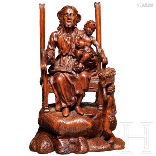 A Flemish boxwood figure of St. Joseph with the Christ Child...