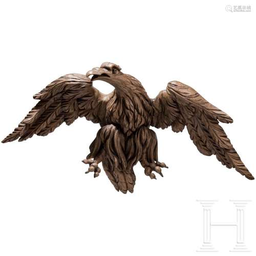 A large German carved walnut eagle from a lectern, 18th/19th...