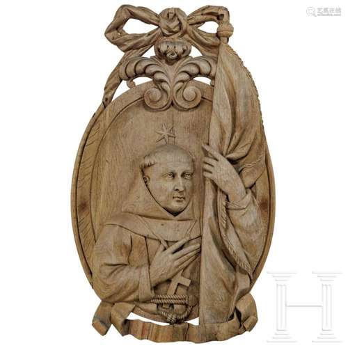 A carved Franconian oak panel showing a monk, 2nd half of th...