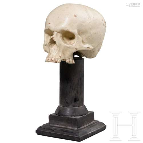 A German wooden memento mori skull, 17th/18th century