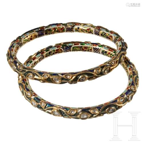 A pair of Indian gold bracelets with enamel and diamonds, ci...