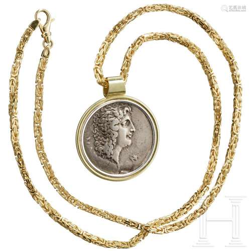 A gold necklace with gold-mounted old Greek tetradrachm coin...