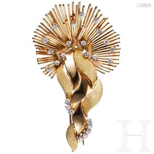 A 14 carat gold and diamond hair clip