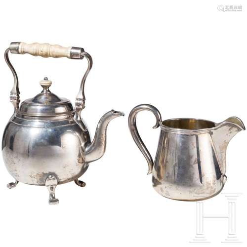 A German silver tea pot and creamer, circa 1850