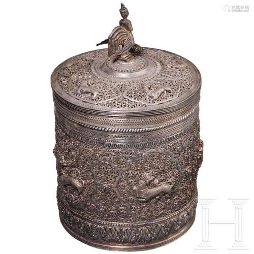 A large Burmese silver lidded box with lions, 19th century