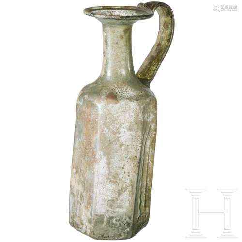 A large Roman glass bottle, 3rd/4th century