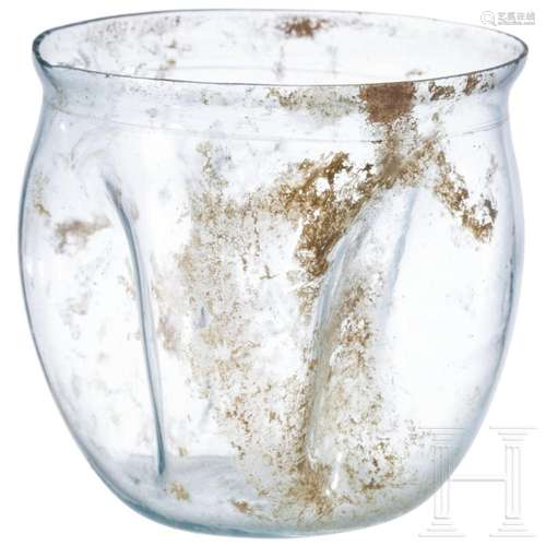 A Roman glass beaker, 3rd century