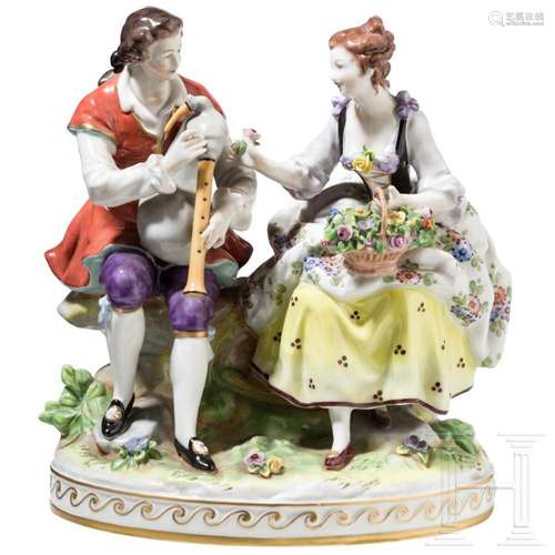 A porcelain figure of a courting couple, Volkstedt, circa 19...