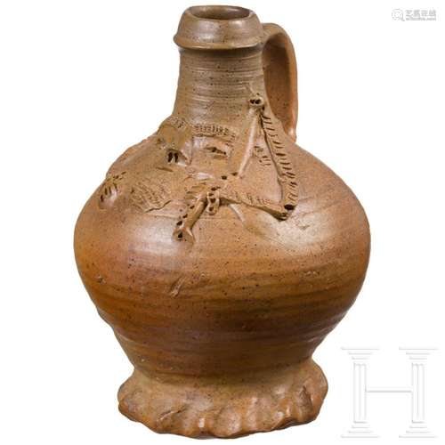 A Raeren stoneware pointed nose jug with a bagpipe player, 1...