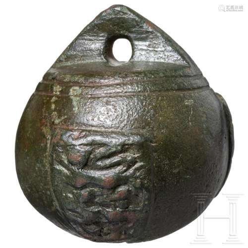 An English steelyard weight, 13th century