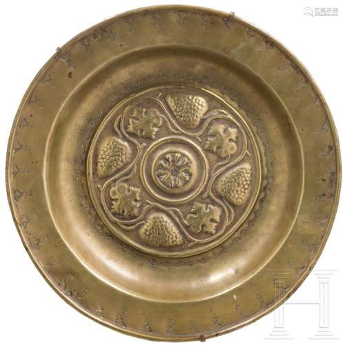 A brass alms dish with grapes, Nuremberg, 16th century