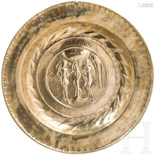 A brass alms dish showing Adam and Eve, Nuremberg, 16th cent...