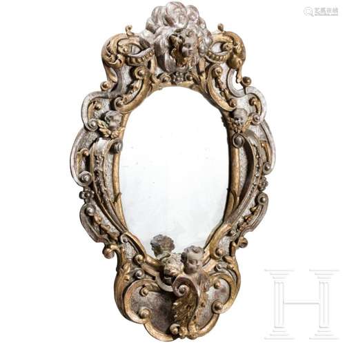 A partially gilded Italian wooden Baroque mirror, circa 1720