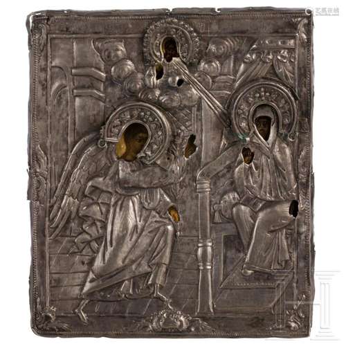 A small Russian icon showing the Annunciation with silver ok...