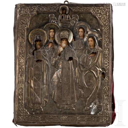 A Russian icon showing five saints with silver oklad, late 1...