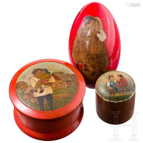 A large Russian wooden Easter egg and two wooden boxes, prob...