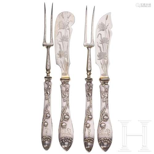 A Russian silver four-piece Art Nouveau cutlery set, dated 1...