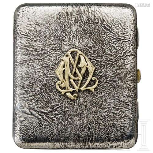 A partially gilt Finnish silver cigarette case with samorodo...