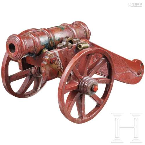 A rhodonite model cannon